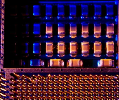 A close up of a metal structure with blue lights