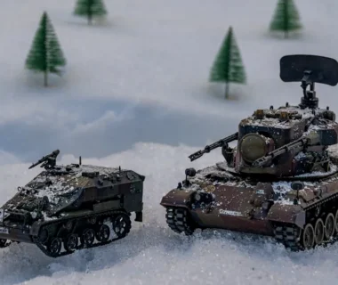 a couple of tanks that are in the snow