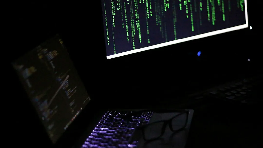 A laptop computer sitting on top of a desk