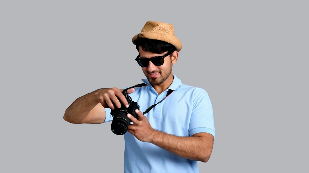 a man holding a camera