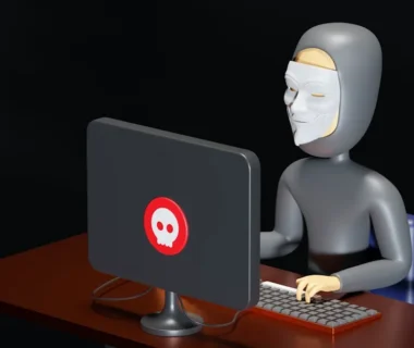 a person sitting at a desk with a computer