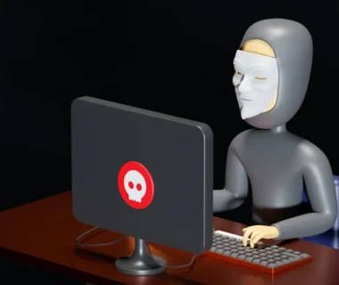 a person sitting at a desk with a computer