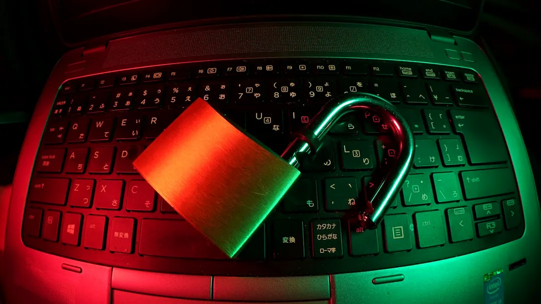 black laptop computer with white paper