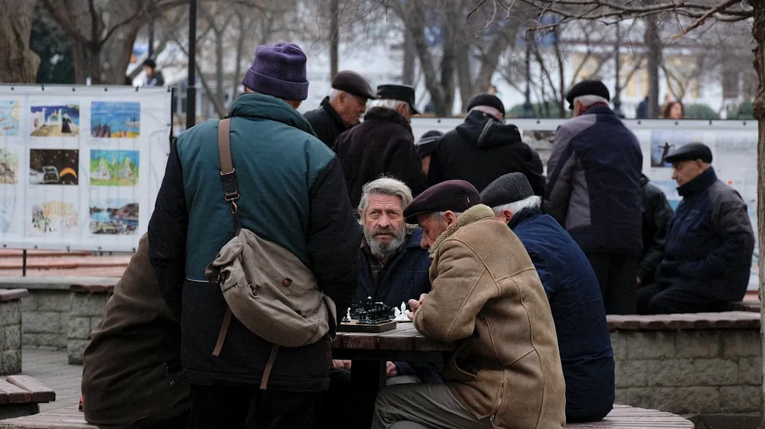 group of men sitting table