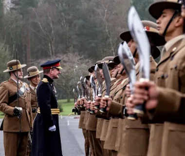 Gurkha soldiers in uniform with kukri knives during a military ceremony in Catterick, England.