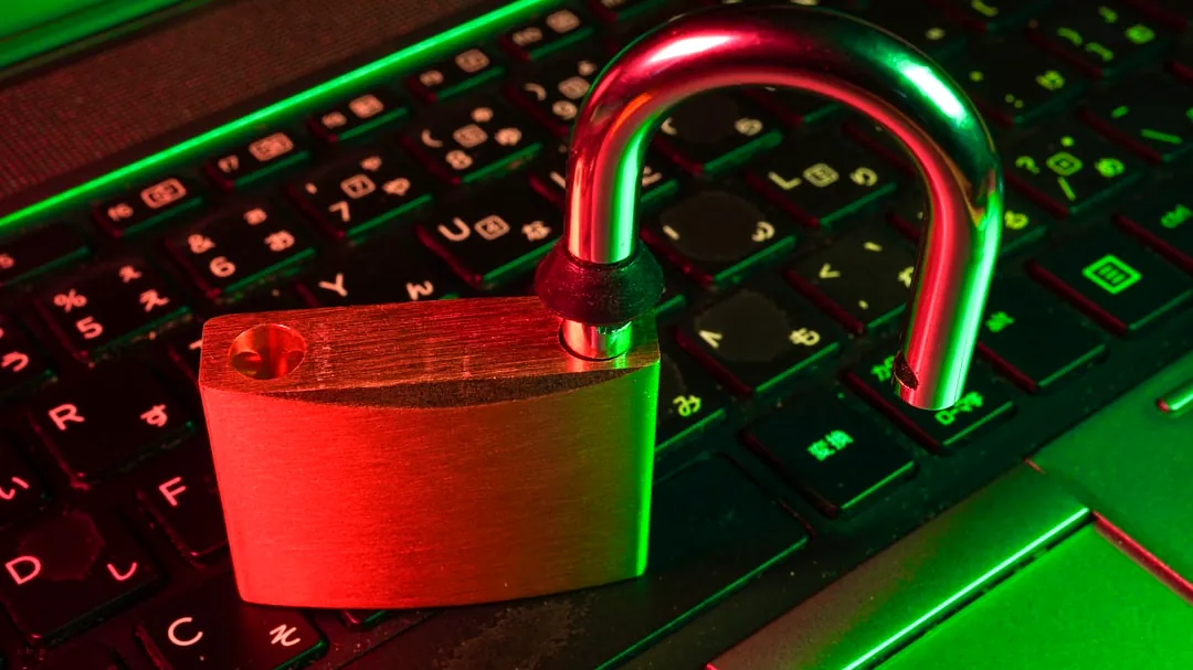 red padlock on black computer keyboard