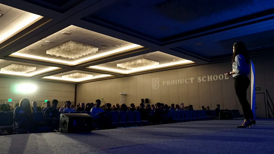 woman standing on stage