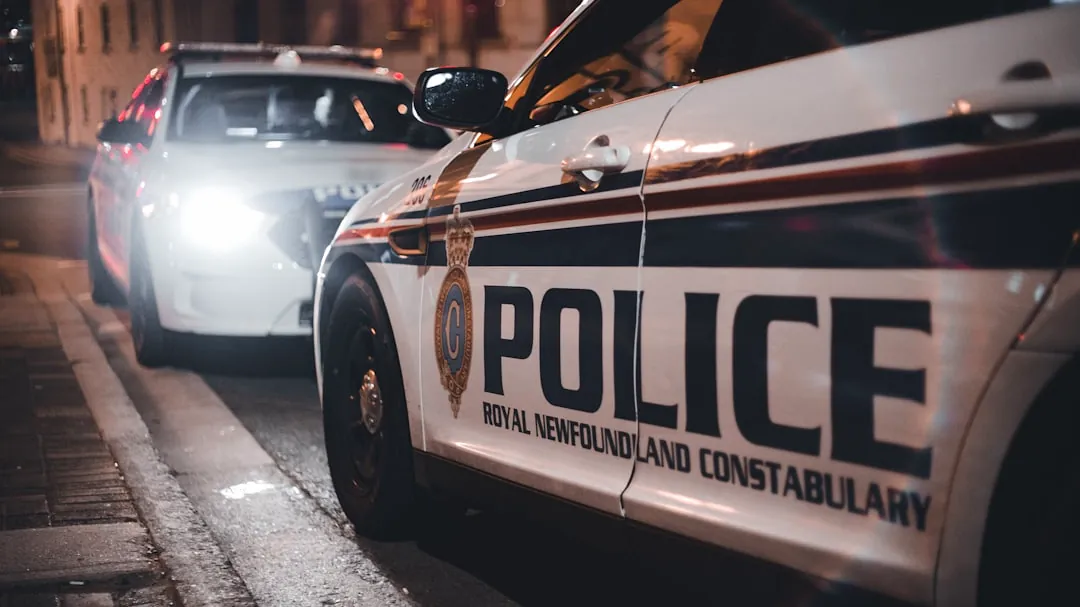 a police car parked on the side of the road