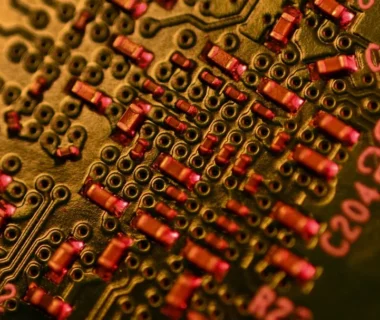 Close-up of a complex electronic circuit board with many components.
