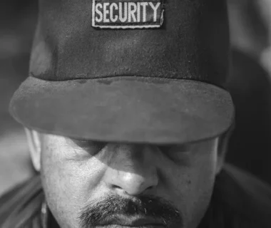 man wearing security cap