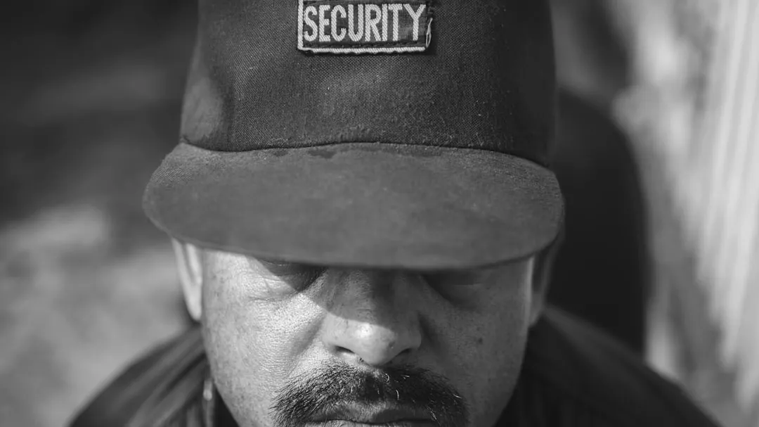 man wearing security cap