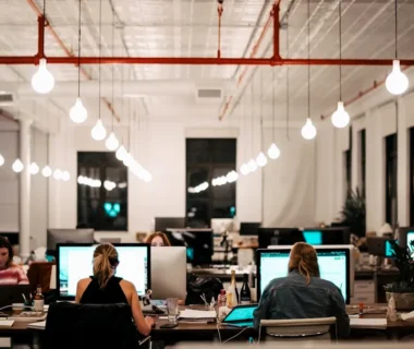 people sitting on chair in front of computer