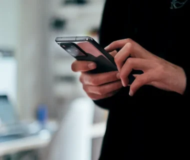 person holding black android smartphone